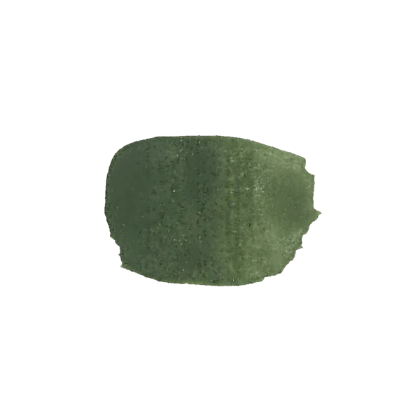 Pietra verde laccata con finitura lucida e dettagli sottili.